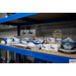 A quantity of blue and white china to include spic