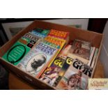 A box of miscellaneous paperback fiction to includ