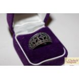 A 925 white stone and pierced ring in purple box