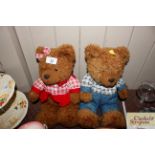 A pair of French Teddy bears, one singing