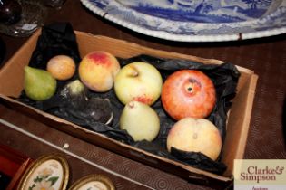 A collection of hardstone and marble fruits