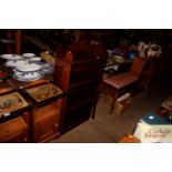 A mahogany open fronted bookcase