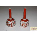 A pair of Kutani onion shaped vases