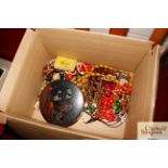 A box of miscellaneous costume jewellery, includin