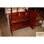 A teak open fronted bookshelf