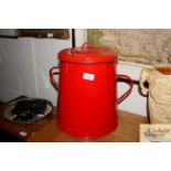 An enamel bread bin