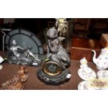 A Victorian marble and spelter mantel clock decora