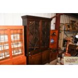 A 19th Century mahogany bookcase, the top with ast