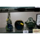 Three Mdina glass paperweights