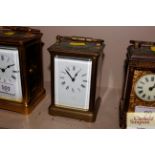 A brass cased striking carriage clock