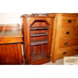 An Edwardian inlaid walnut music cabinet