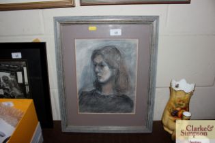 A pastel portrait study of a young woman