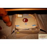 A box of vintage 78rpm records