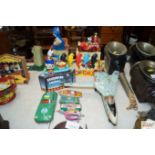 A collection of tin plate and other toys to includ