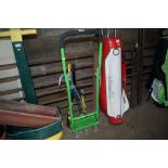 A Handy lawn aerator and a pair of telescopic shea