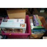 Two boxes containing puzzles; games etc