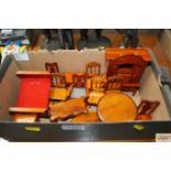 A box of dolls house furniture