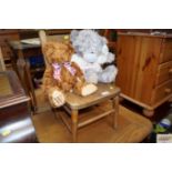 An elm seated child's chair and two teddy bears