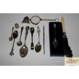A collection of various plated and silver spoons;