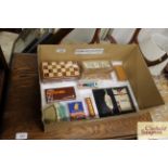 A box of nine vintage table top games