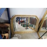 A gilt framed overmantel mirror