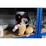 A Walt Disney Micky Mouse stuffed toy