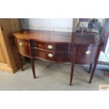 A Thomasville serpentine fronted sideboard