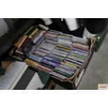 A box of various CD's