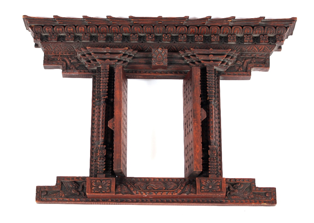 A late 19th Century Chinese carved wooden architectural frame, the pagoda type edge and twin opening - Image 2 of 2