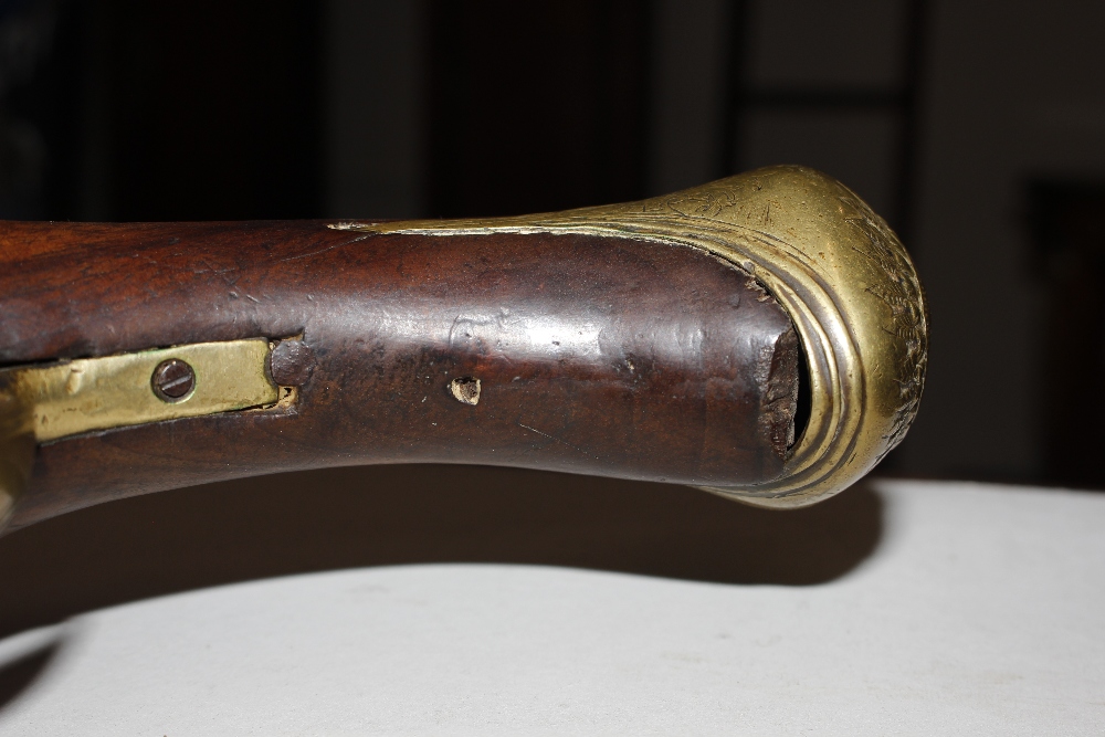 An 18th Century flintlock pistol, with brass mounts - Image 17 of 25