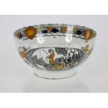 An 18th Century Salopian ware fluted slops bowl, decorated riverbank scenes and foliage, 15.5cm dia.