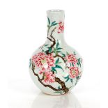 A Chinese famille rose vase, of baluster form decorated with enamels of blossom and small branches