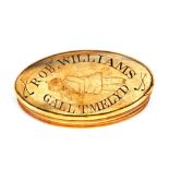A 19th Century horn oval shaped snuff box, inscribed "Robert Williams Melyten and Miner" dated 1850,