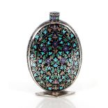 An early 20th Century metal Indo / Persian perfume flask, of flattened oval form with over