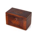 A Georgian mahogany and cross banded tea caddy, with shell inlaid decoration