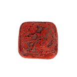 A Chinese cinnabar lacquer box and cover, of square outline decorated with a dragon amongst foliage,