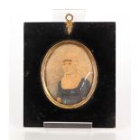 A 19th Century miniature portrait, of a lady wearing a lace cap and blue dress, (faded), contained