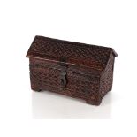 An Oriental carved wooden ark, with hinged angle lid and all over lozenge devices, 30cm