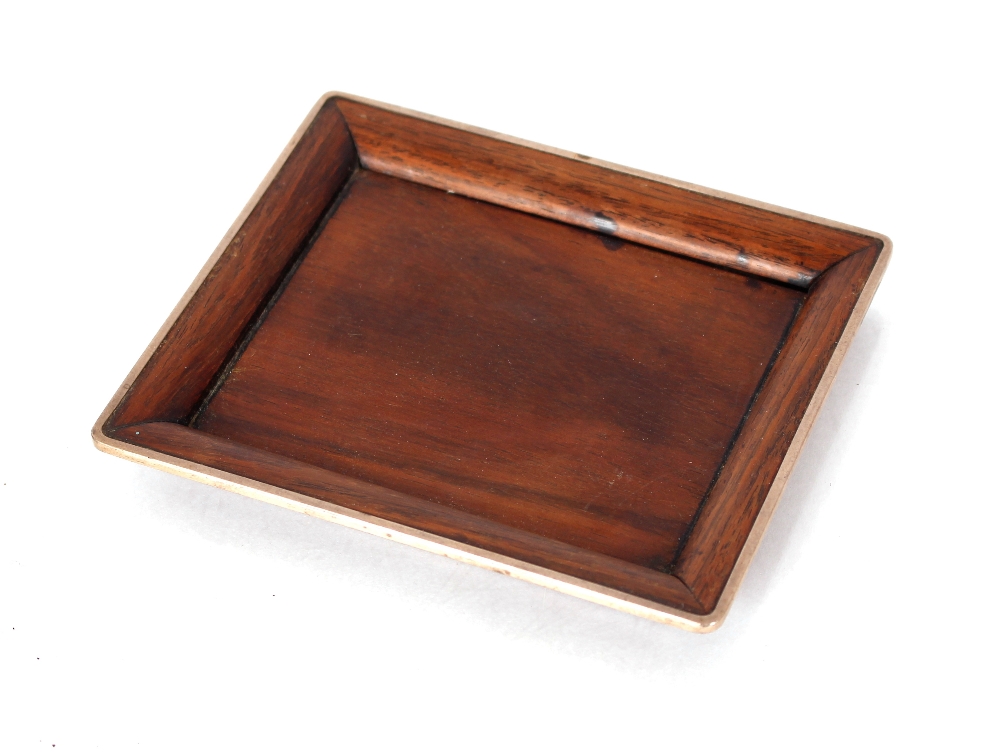 A small late 19th Century rosewood and white metal banded tray, for calling cards, 14cm