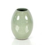 A Chinese Celadon ground vase, decorated with roundels depicting dragons and glazed white dot