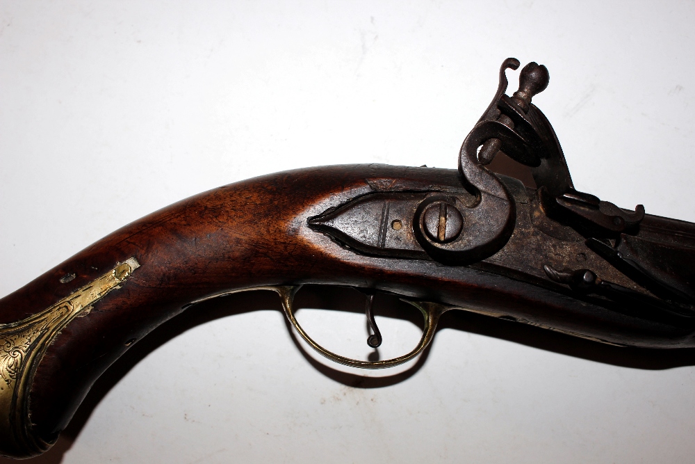 An 18th Century flintlock pistol, with brass mounts - Image 11 of 25