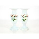 A pair of Victorian white opaque glass baluster vases, with enamelled floral decoration, 21cm high