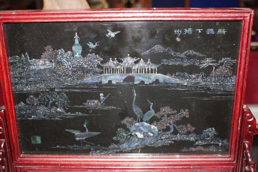 A Chinese carved hardwood and pieced table screen, decorated animals, lake, landscapes, bridge and - Image 3 of 6