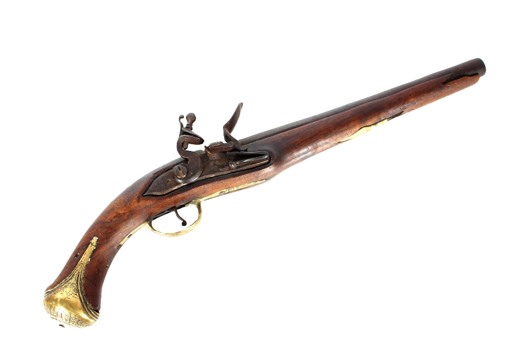 An 18th Century flintlock pistol, with brass mounts