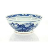 A large 19th Century Chinese blue and white bowl, decorated foliage and butterflies, 30cm dia. (