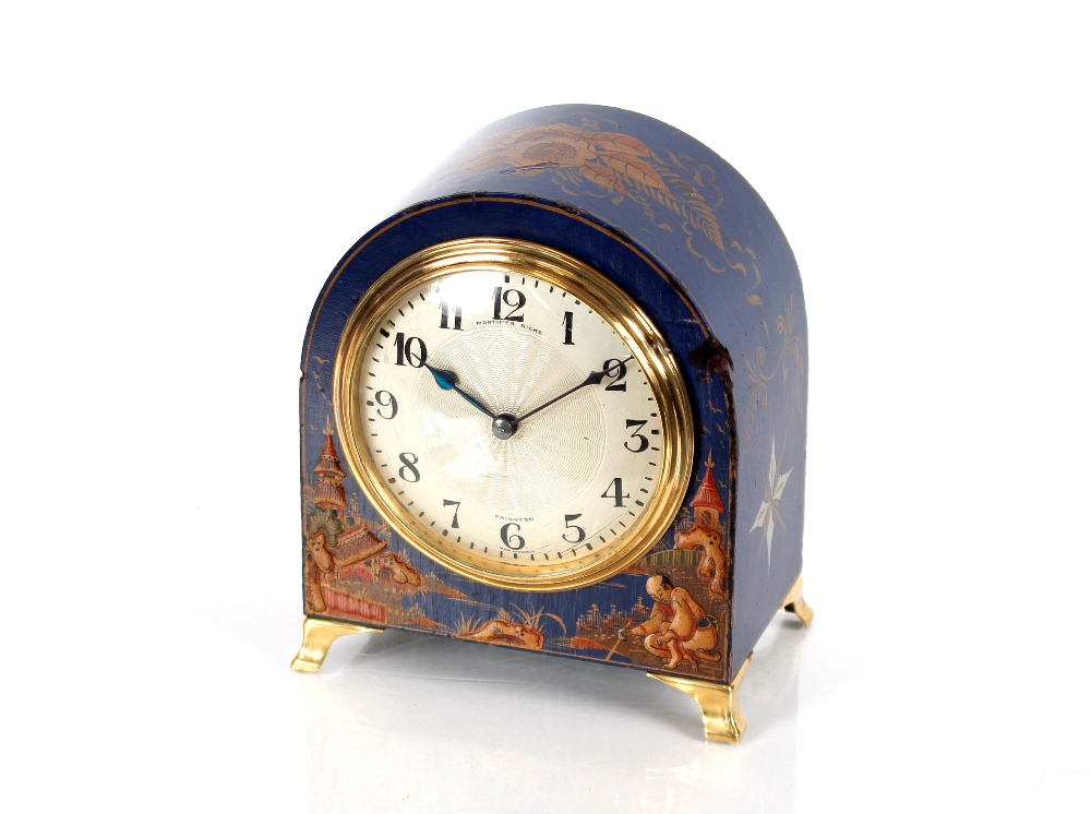 An early 20th Century blue lacquer and chinoiserie decorated desk clock, of arched form by