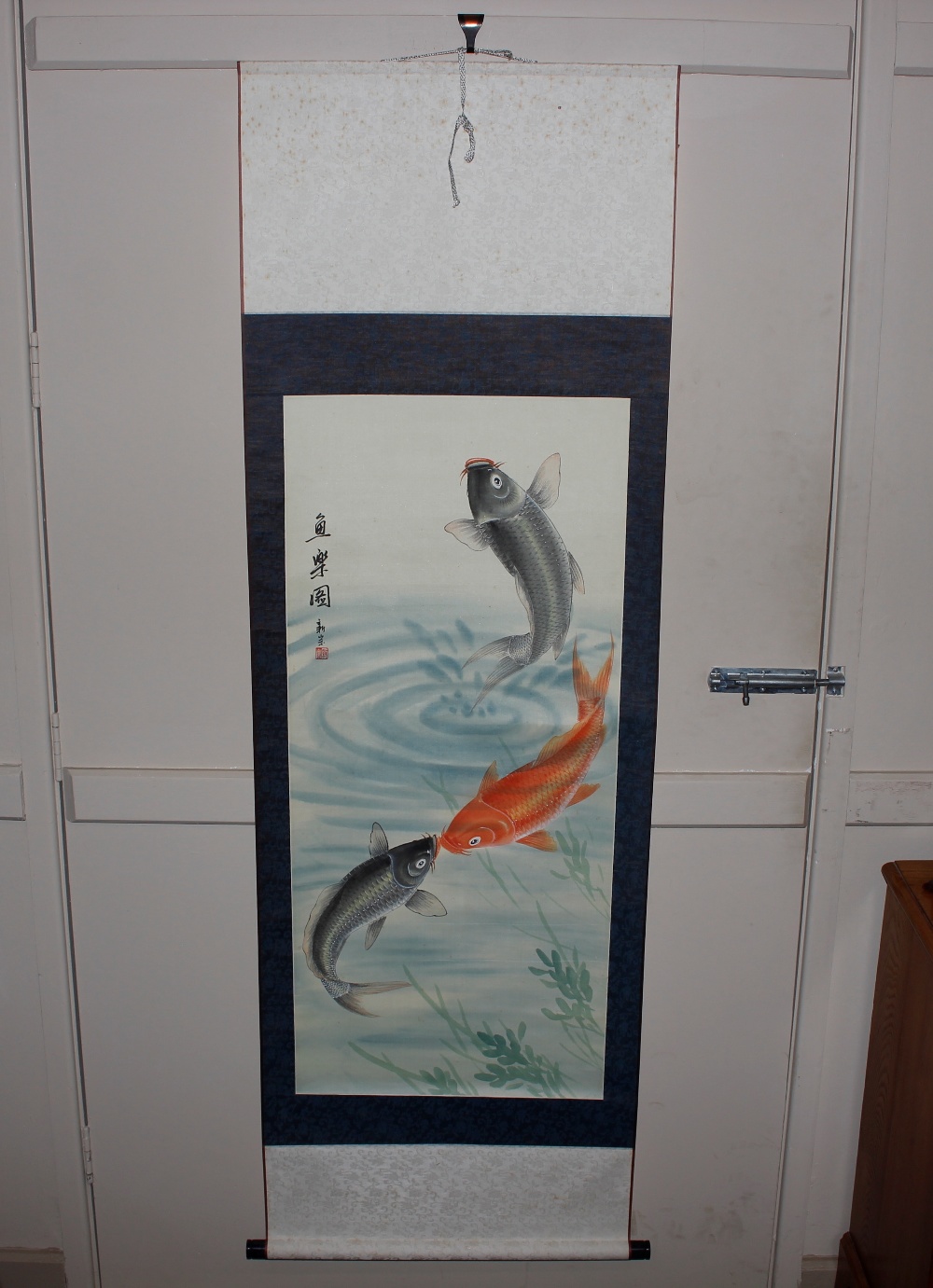 An Oriental painting on silk, depicting a leaping fish and two further fish below with signature and - Image 2 of 4