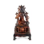 A Chinese bronze seated Buddha figure, 26cm high