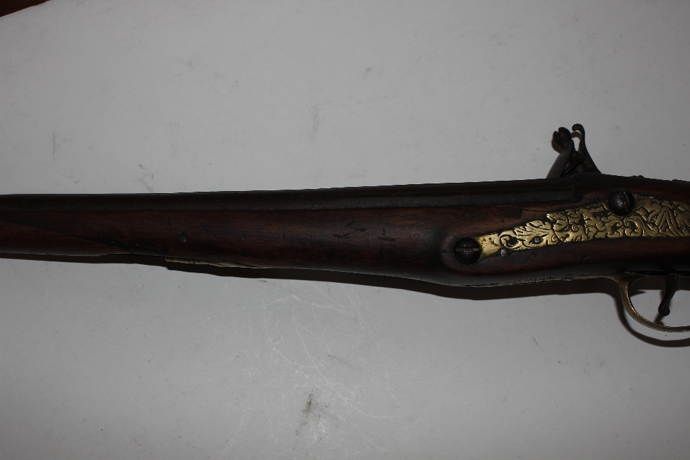 An 18th Century flintlock pistol, with brass mounts - Image 14 of 25