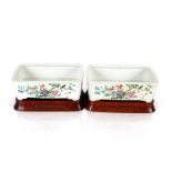 A pair of Chinese famille rose decorated jardinières, of rectangular form, 24cm wide x 16cm deep,